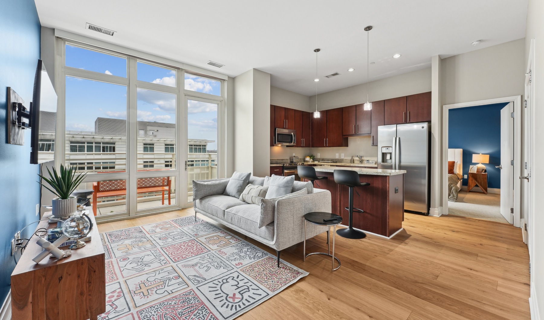 open concept living room adjacent to kitchen