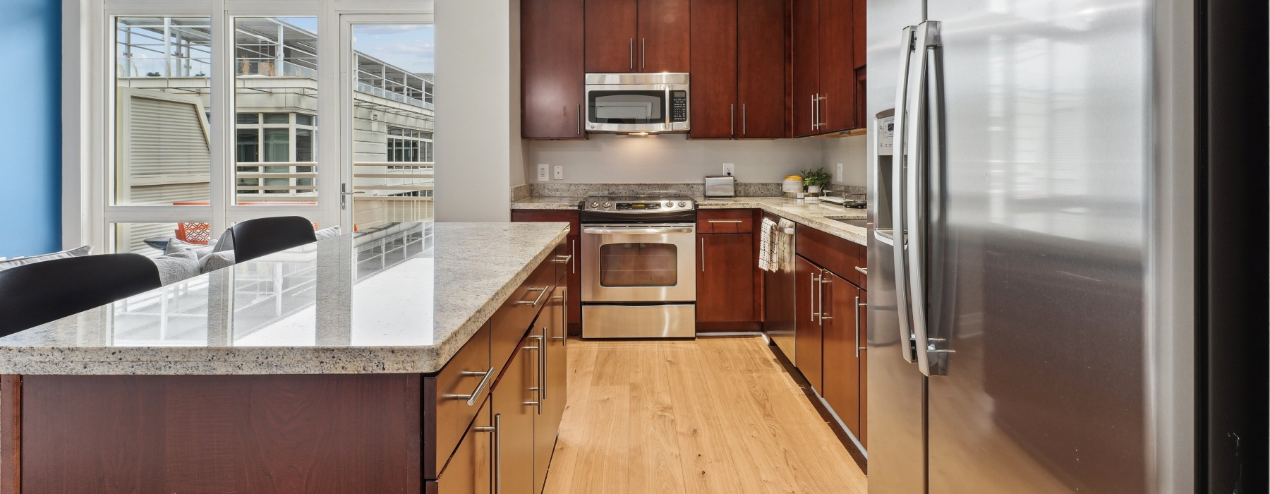 kitchen with stainless steel appliances and island